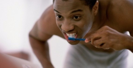 Brushing-teeth-black-man-credit-Purestock-79072815-630x421-630x330